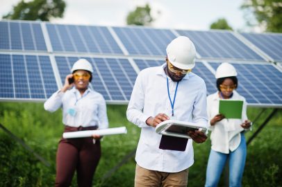 african american technician checks maintenance solar panels group three black engineers meeting solar station 1 scaled e1772461430468